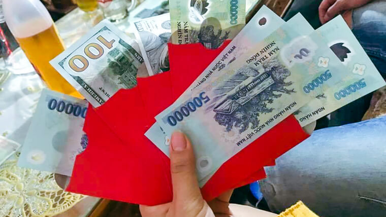 Traditional “Li Xi” Custom - Giving Luckey Money on Tet in Vietnam