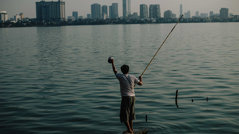 Fishing in West Lake Hanoi