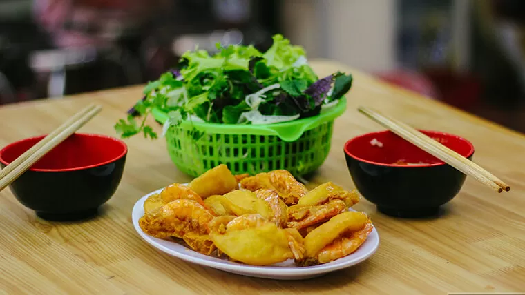 enjoy shrimp cake - best things to do in hanoi