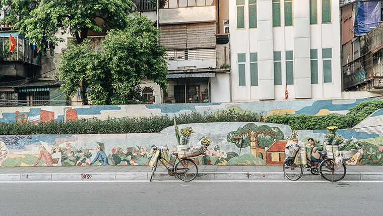 walking along hanoi ceramic mosaic mural 