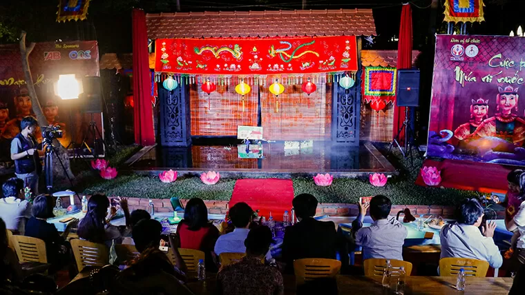 watch water puppet show hanoi things to do